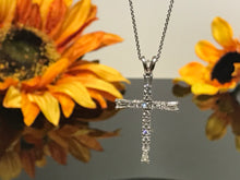 Load image into Gallery viewer, 18 K.T. WHITE GOLD LADIES DIAMOND CROSS WITH ROUND &amp; BAGUETTE DIAMONDS
