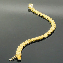 Load image into Gallery viewer, 14 K.T. LADIES YELLOW GOLD FANCY CHEVRON DIAMOND CUT DESIGN BRACELET
