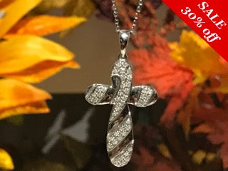 14 K.T. LADIES WHITE GOLD DIAMOND CROSS WITH ROUND PAVE SET DIAMONDS