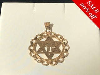 14 K.T. YELLOW GOLD JEWISH STAR MEDALLION WITH CARVED HALO