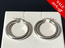 Load image into Gallery viewer, 14 K.T. WHITE GOLD LADIES TUBULAR POLISHED HOOP EARRING ROUND SHAPE
