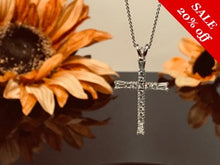 Load image into Gallery viewer, 18 K.T. WHITE GOLD LADIES DIAMOND CROSS WITH ROUND &amp; BAGUETTE DIAMONDS
