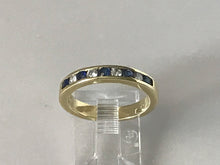 Load image into Gallery viewer, 14 K.T. LADIES YELLOW GOLD DIAMOND &amp; SAPPHIRE CHANNEL SET WEDDING BAND

