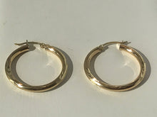 Load image into Gallery viewer, 14 K.T. YELLOW GOLD LADIES TUBULAR ROUNG DIAMOND CUT HOOP EARRING
