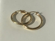 Load image into Gallery viewer, 14 K.T. YELLOW GOLD LADIES TUBULAR ROUNG DIAMOND CUT HOOP EARRING
