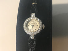 Load image into Gallery viewer, PLATINUM LADIES ANTIQUE/ ESTATE WATCH W/ A BLACK CORDED BAND
