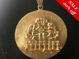 14 K.T. YELLOW GOLD ANTIQUE/ ESTATE MEDALLION WITH A CARVED MENORAH